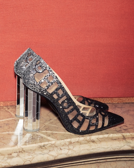 Sparkling high-heeled shoes with crystals, graphic cutouts, and mirrored heels