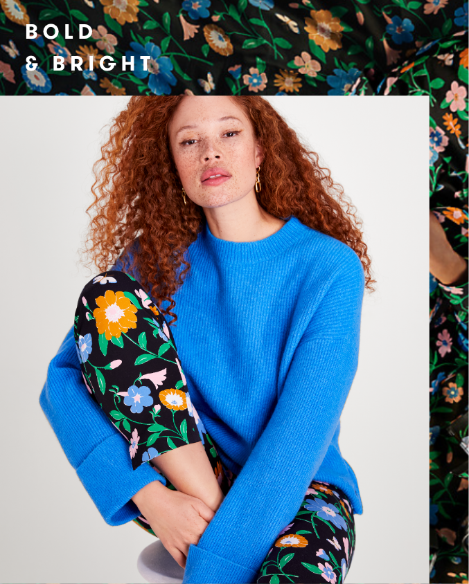 female model wearing blue sweater from Kate Spade