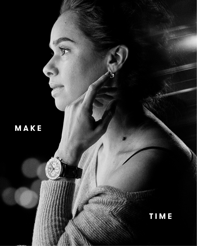 Woman wearing Breitling watch black & white image