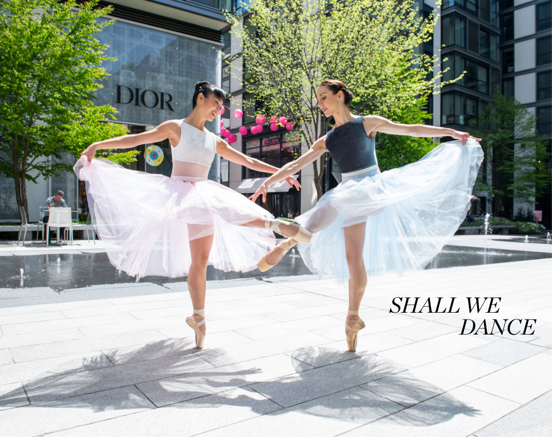 Dancing women from the Washington Ballet in the Plaza at CityCenterDC.